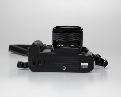 Minolta Maxxum 70 35mm film camera with 50mm f1.7 lens; bottom view