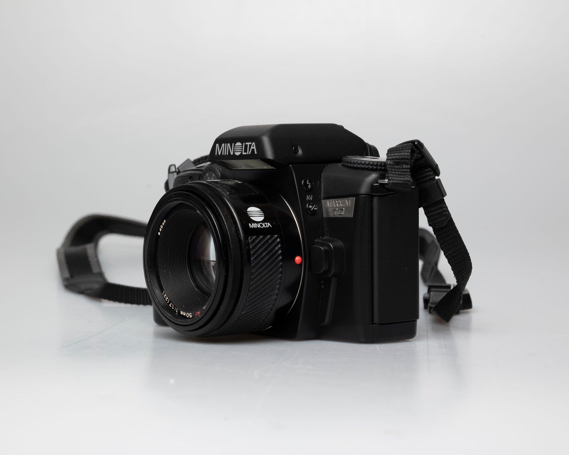 Minolta Maxxum 70 35mm film camera with 50mm f1.7 lens; front view other angle