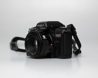 Minolta Maxxum 70 35mm film camera with 50mm f1.7 lens; front view other angle