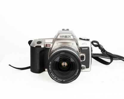 Minolta Maxxum XTsi reflex à film 35 mm avec objectif 28-80 mm + sac pour appareil photo Minolta + télécommande (série 94009570)
