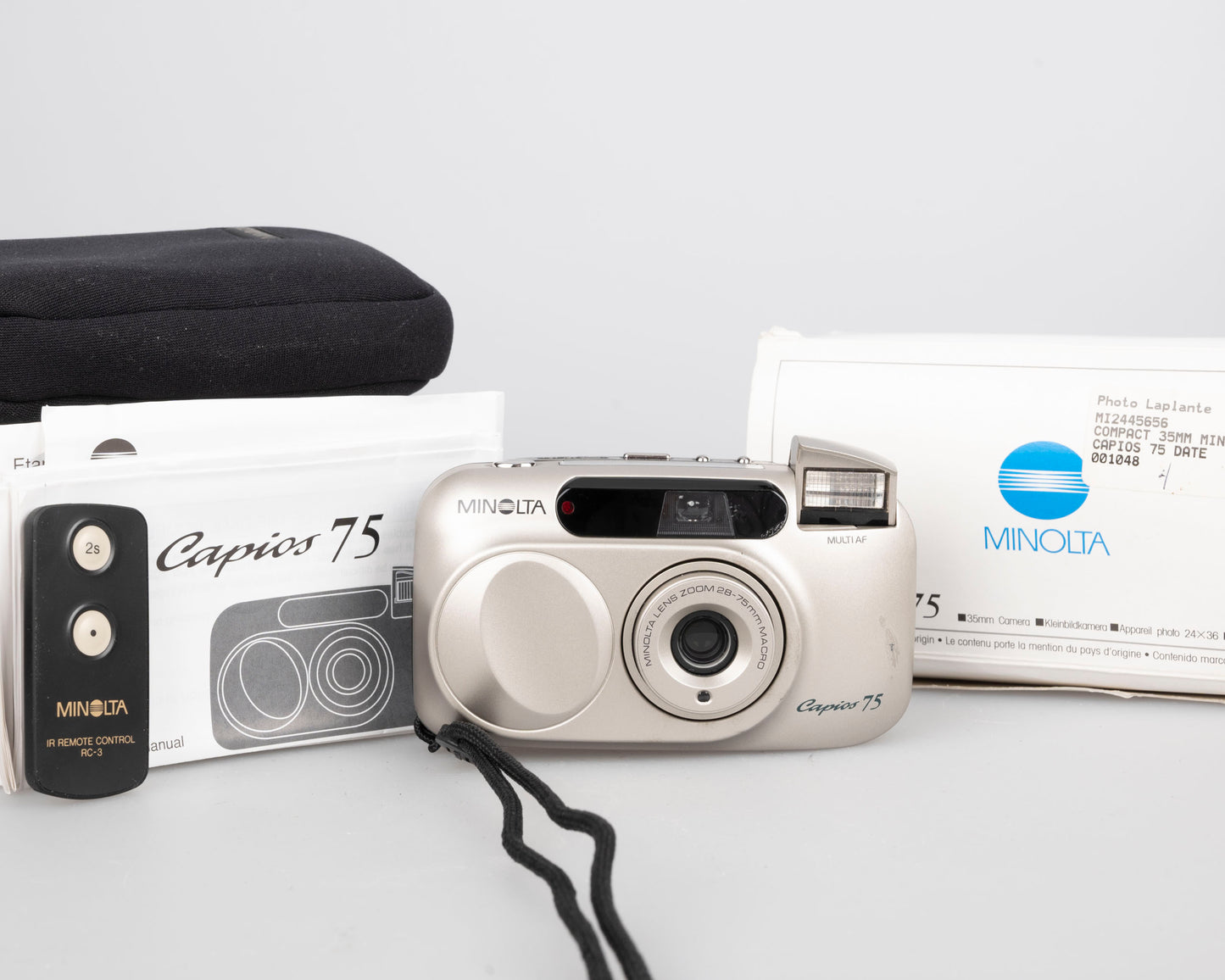 Appareil photo Minolta Capios 75 35 mm avec télécommande + étui + boîte d'origine + manuel (série 31101989)