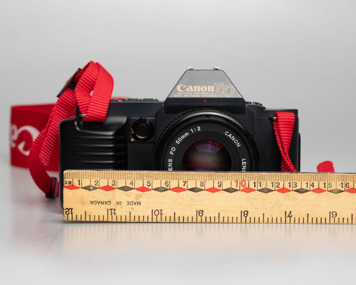 Canon T70 35mm SLR w/ FD 50mm f2 lens + manual (serial 2034155)