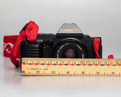 Canon T70 35mm SLR w/ FD 50mm f2 lens + manual (serial 2034155)