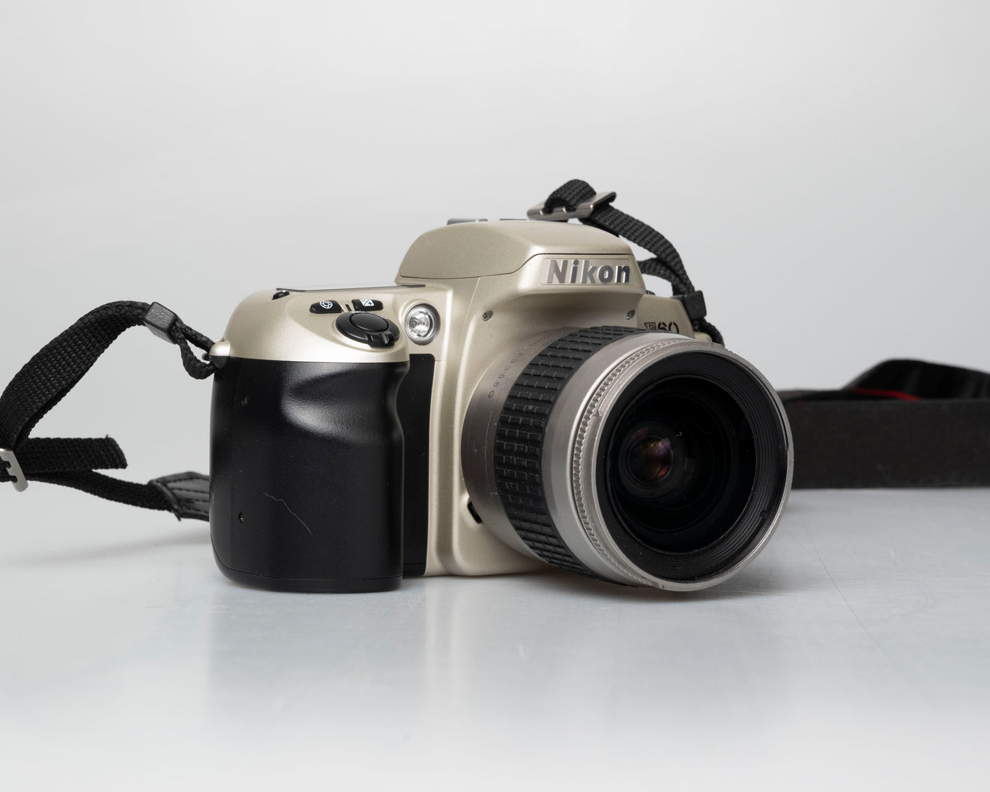 Nikon F60 35mm film SLR w/ AF Nikkor 28-80mm lens (serial 2210585)