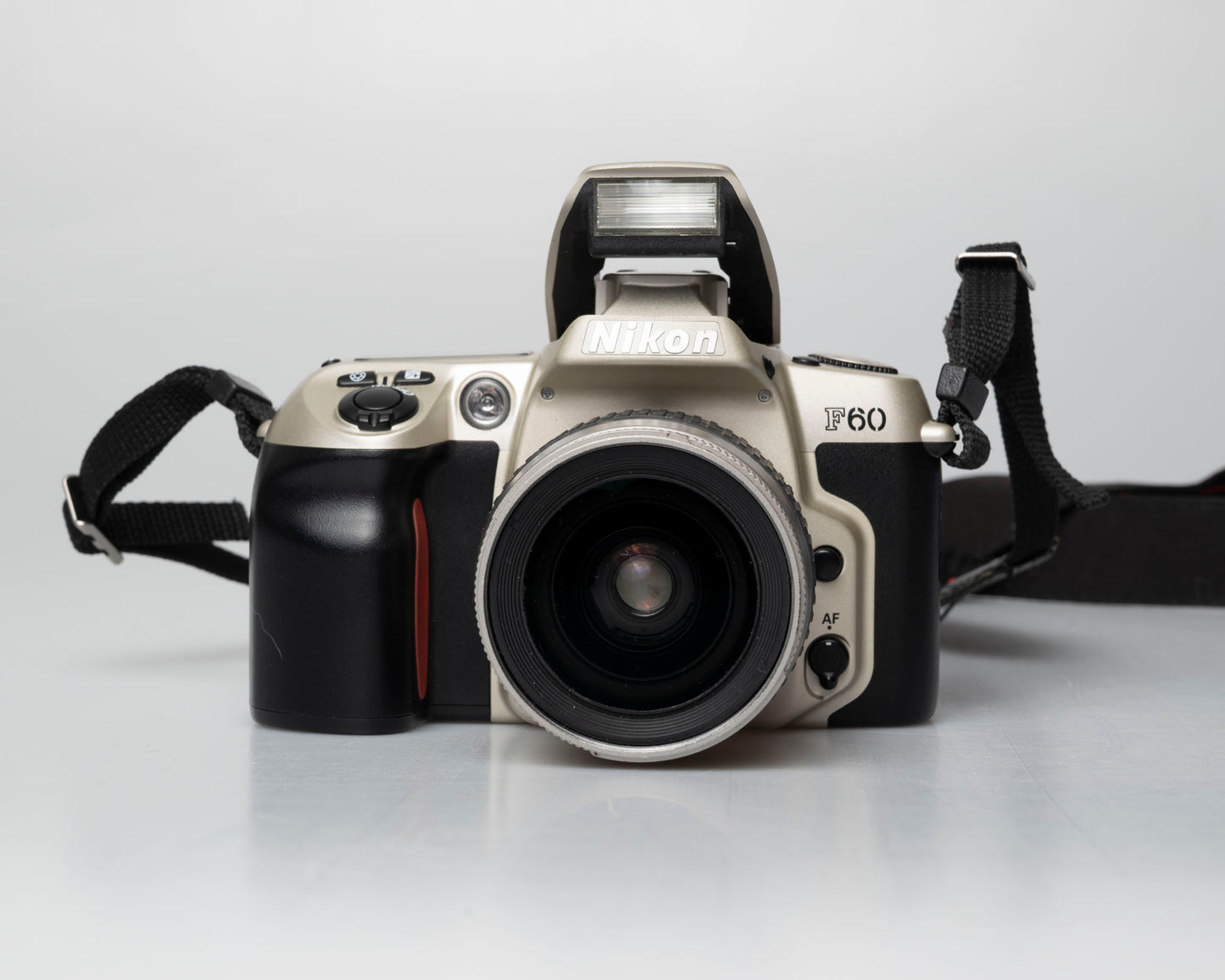 Nikon F60 35mm film SLR w/ AF Nikkor 28-80mm lens (serial 2210585)