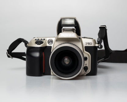 Nikon F60 35mm film SLR w/ AF Nikkor 28-80mm lens (serial 2210585)