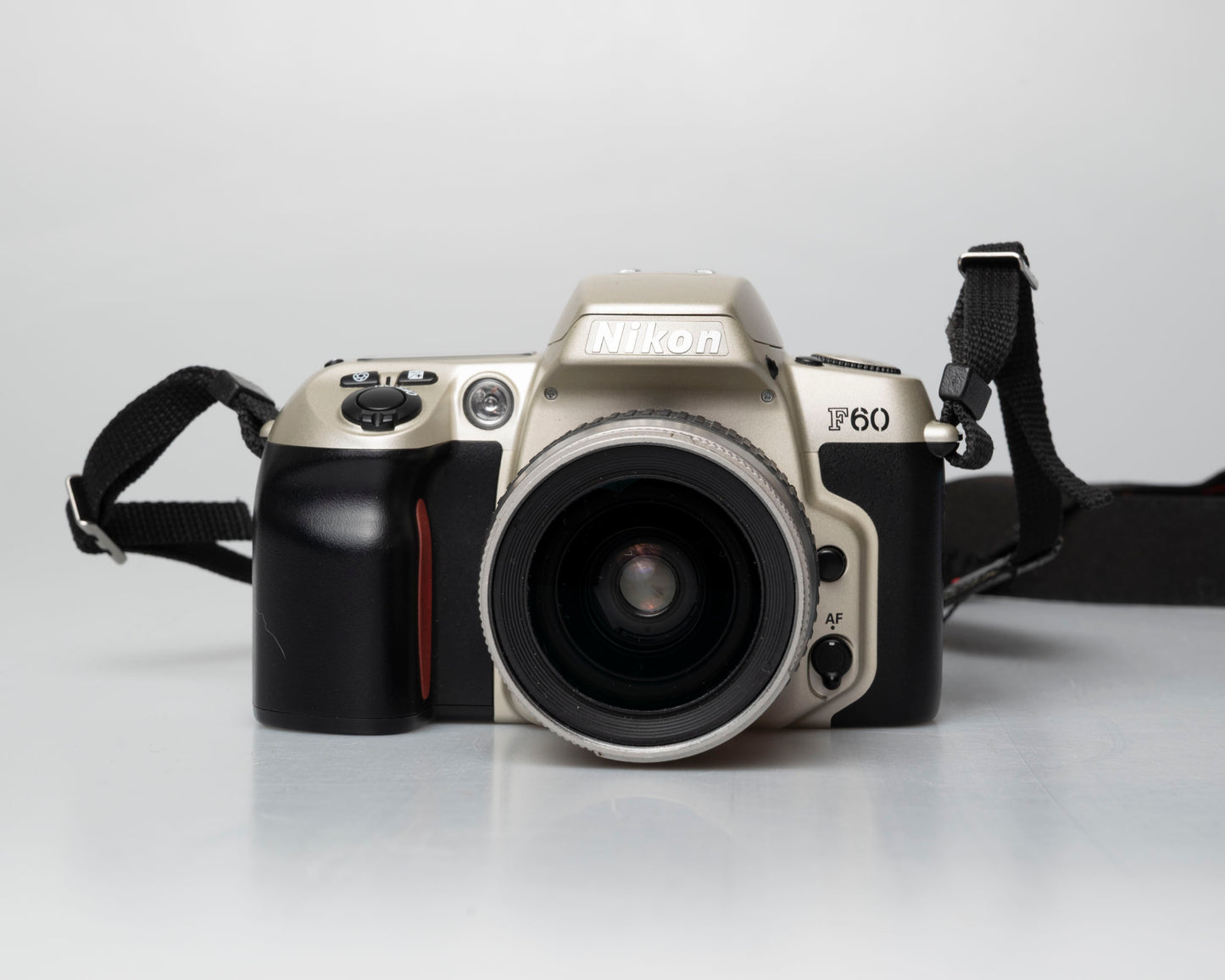 Nikon F60 35mm film SLR w/ AF Nikkor 28-80mm lens (serial 2210585)