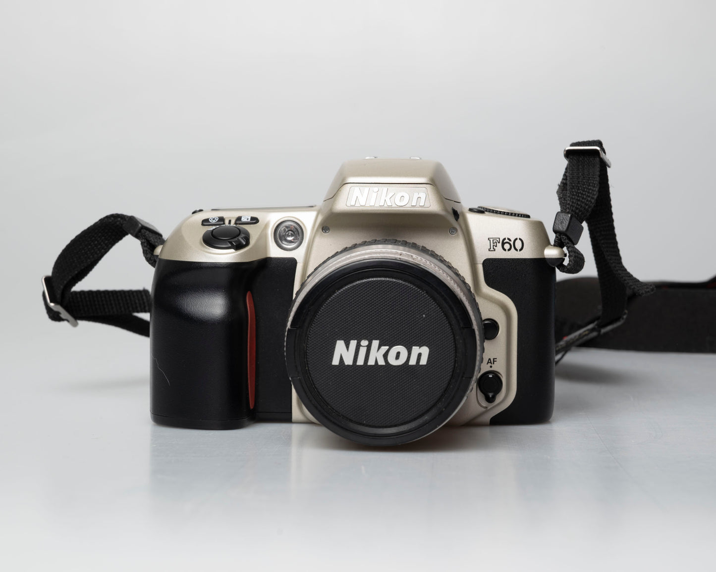 Nikon F60 35mm film SLR w/ AF Nikkor 28-80mm lens (serial 2210585)