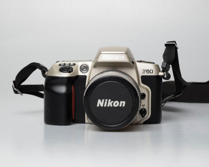 Nikon F60 35mm film SLR w/ AF Nikkor 28-80mm lens (serial 2210585)