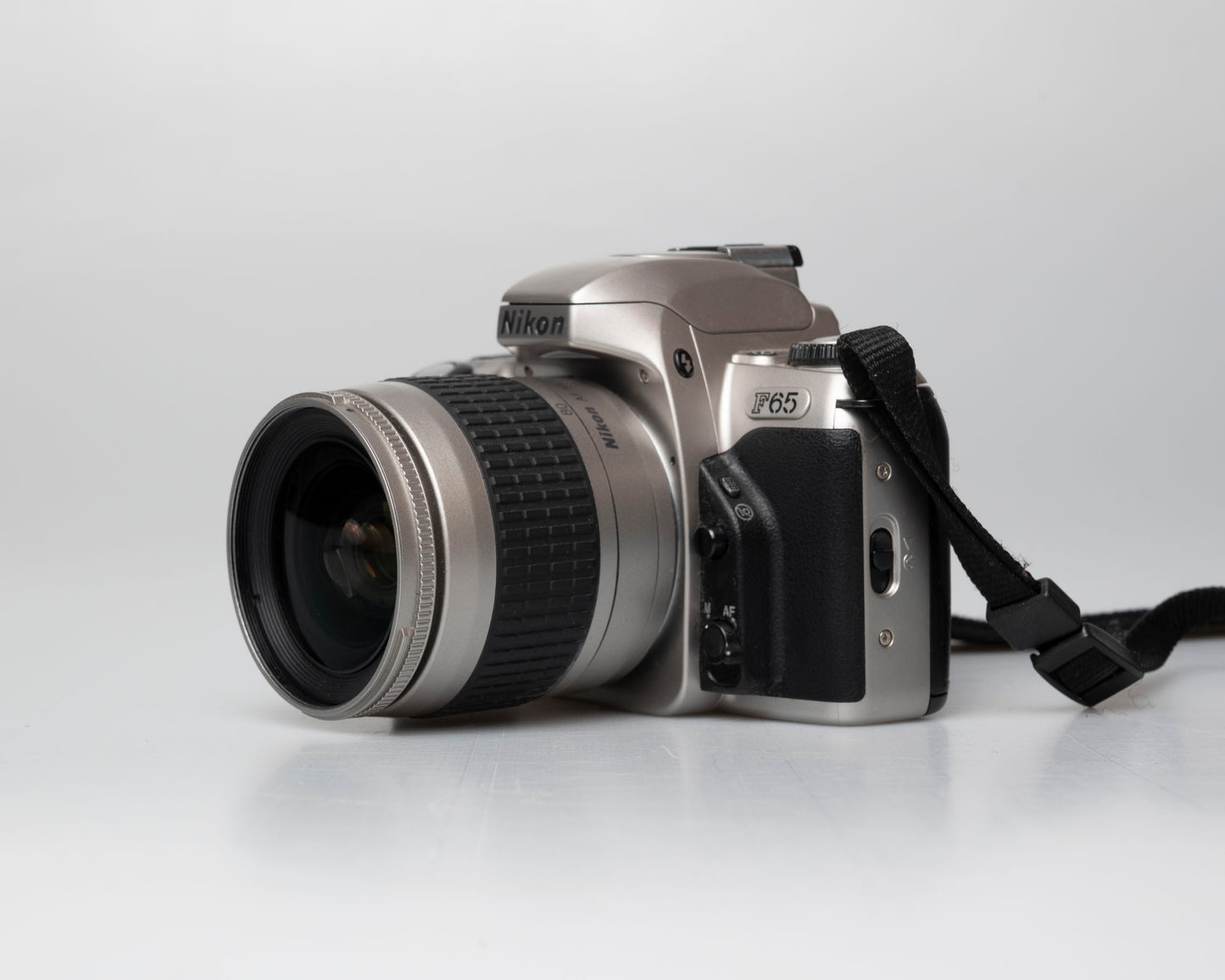 Nikon F65 (aka N65) 35mm film SLR w/ AF Nikkor 28-80mm lens (serial 2880569)