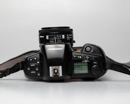 Nikon F90 35mm film SLR w/ AF Nikkor 50mm f1.8 lens (serial 2182919) | film🎞tested