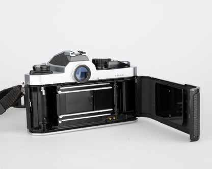 Nikon FM2n 35mm film SLR camera w/ Nikkor 50mm f1.8 lens + manuals in English and French (serial 8518258)
