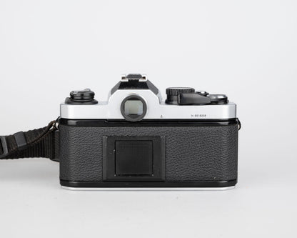 Nikon FM2n 35mm film SLR camera w/ Nikkor 50mm f1.8 lens + manuals in English and French (serial 8518258)
