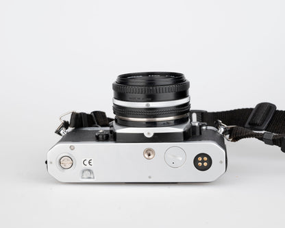 Nikon FM2n 35mm film SLR camera w/ Nikkor 50mm f1.8 lens + manuals in English and French (serial 8518258)