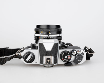 Nikon FM2n 35mm film SLR camera w/ Nikkor 50mm f1.8 lens + manuals in English and French (serial 8518258)