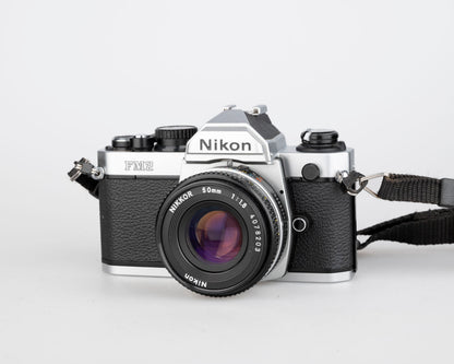 Nikon FM2n 35mm film SLR camera w/ Nikkor 50mm f1.8 lens + manuals in English and French (serial 8518258)