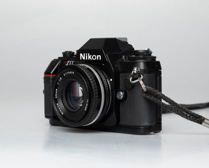 Nikon N2000 35mm film SLR w/ Nikkor 50mm f1.8 lens + case (serial 2926038) | film🎞tested