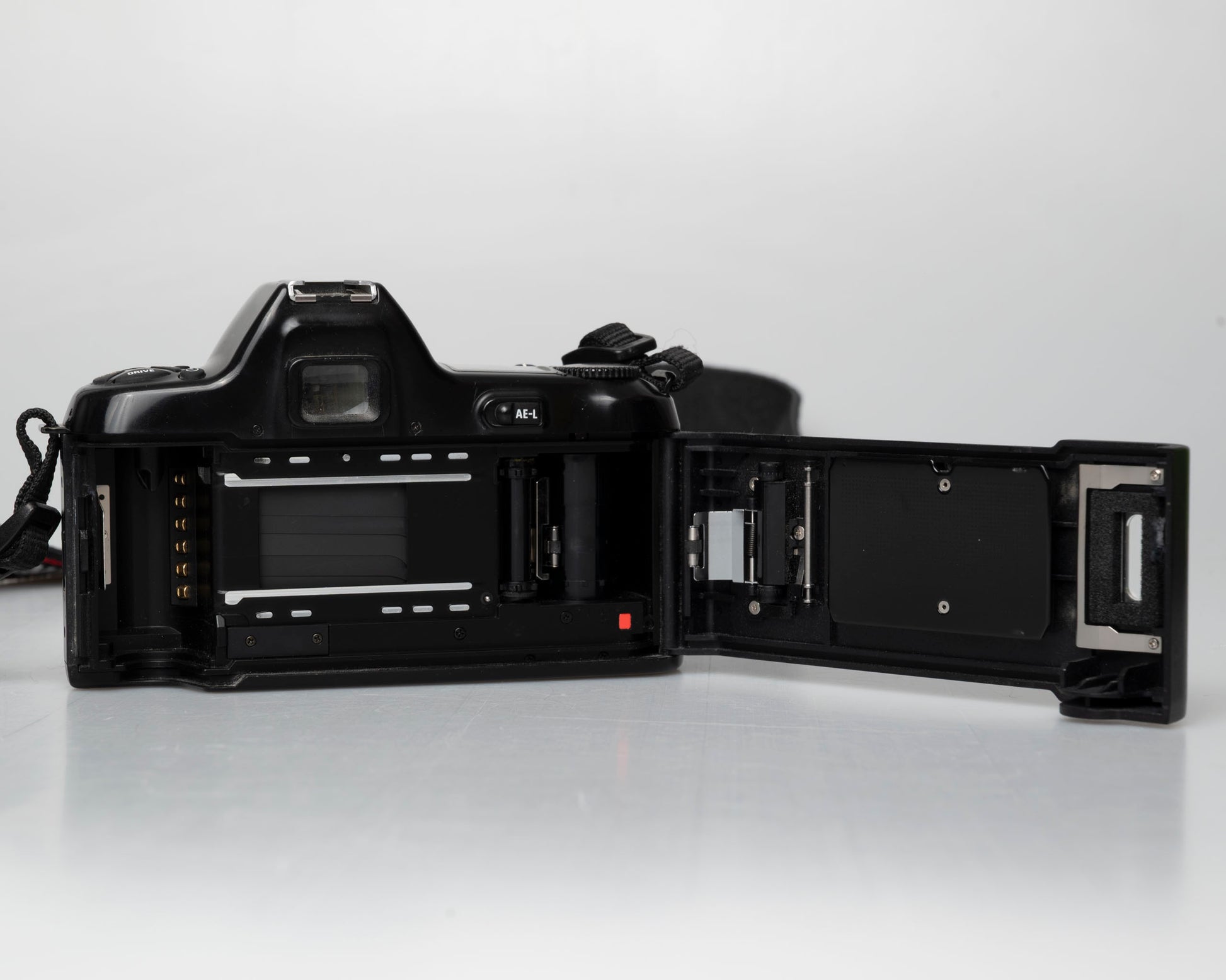 Nikon N6000 35mm film camera; back view with film door open