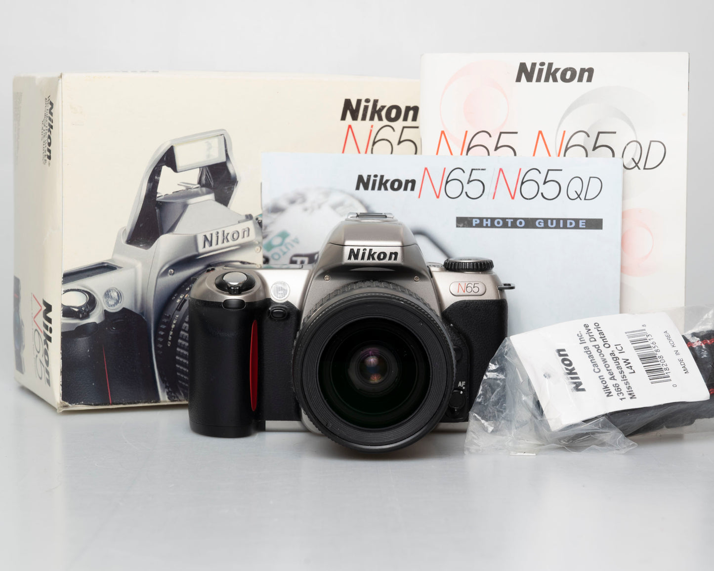 Nikon N65 35mm film SLR w/ AF Nikkor 28-80mm lens in original box (serial 3260549)
