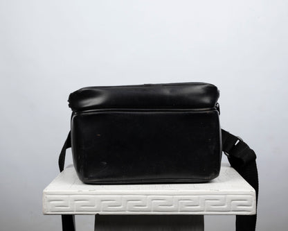 Sac pour appareil photo Nikon noir de taille moyenne avec bordure rouge
