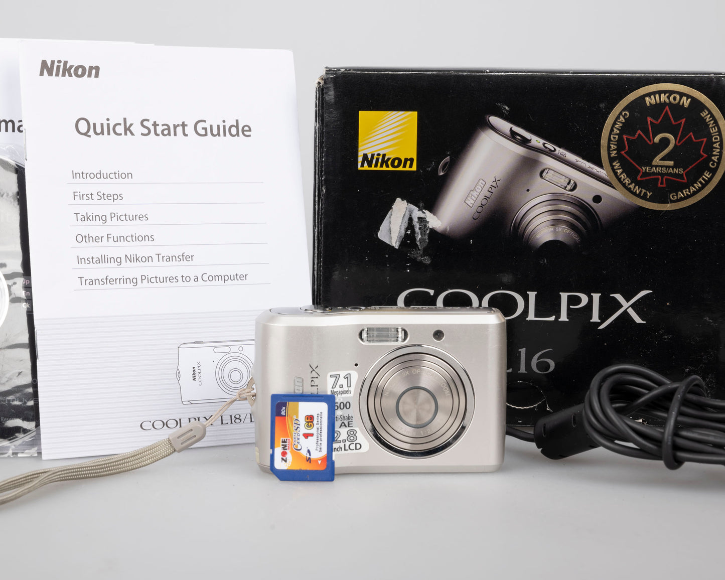 Appareil photo numérique à capteur CCD Nikon Coolpix L16 7,1 MP avec carte SD de 1 Go + boîte d'origine et accessoires (utilise des piles AA)
