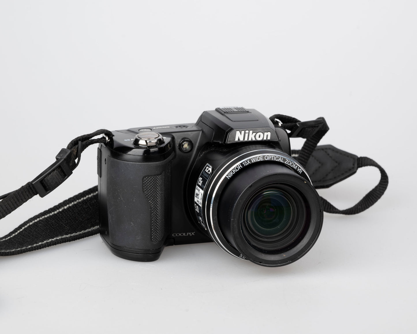 Nikon Coolpix L100 12.1 MP CCD sensor digicam (uses AA batteries + SD card)