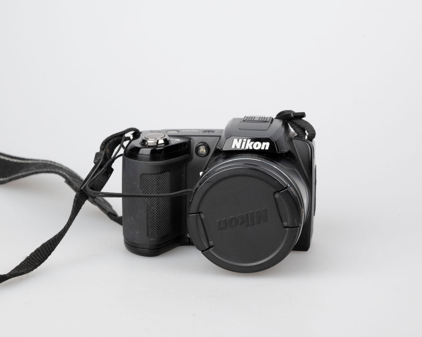 Nikon Coolpix L100 12.1 MP CCD sensor digicam (uses AA batteries + SD card)
