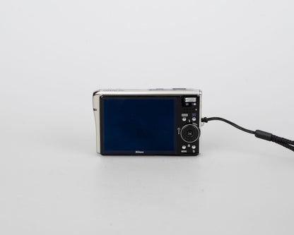 Nikon Coolpix S51C 8.1 MP digicam w/ 4GB SD card + battery + charger + manuals
