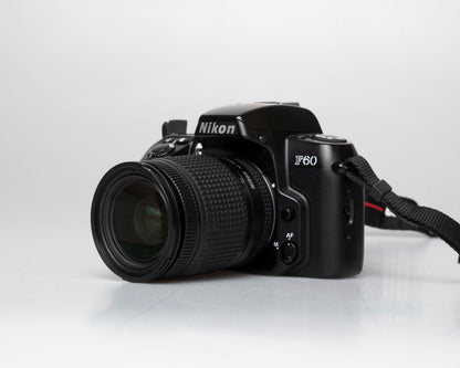 Nikon F60 35mm film SLR w/ AF Nikkor 28-80mm lens + manual (serial 2696418)