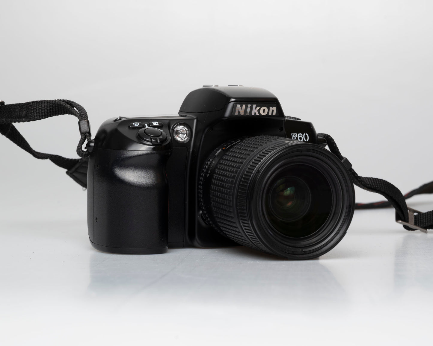 Nikon F60 35mm film SLR w/ AF Nikkor 28-80mm lens + manual (serial 2696418)