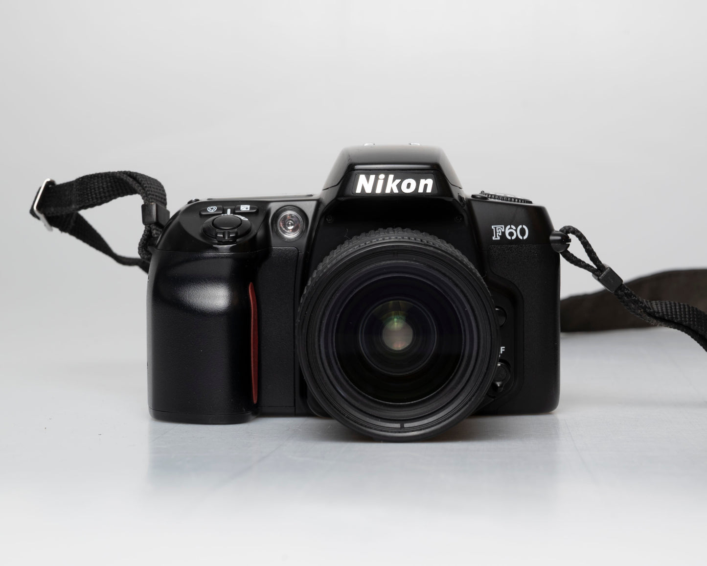 Nikon F60 35mm film SLR w/ AF Nikkor 28-80mm lens + manual (serial 2696418)