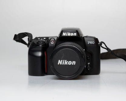 Nikon F60 35mm film SLR w/ AF Nikkor 28-80mm lens + manual (serial 2696418)