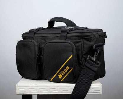 Nikon black and yellow large camera bag