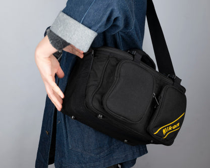 Nikon black and yellow large camera bag