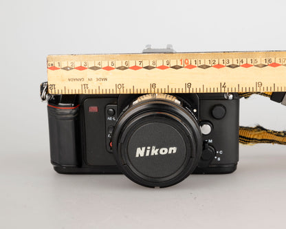 Nikon N2020 35mm film SLR w/ AF Nikkor 50mm f1.8 lens (serial 5387168)