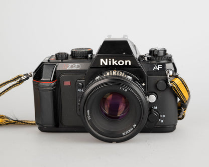 Nikon N2020 35mm film SLR w/ AF Nikkor 50mm f1.8 lens (serial 5387168)