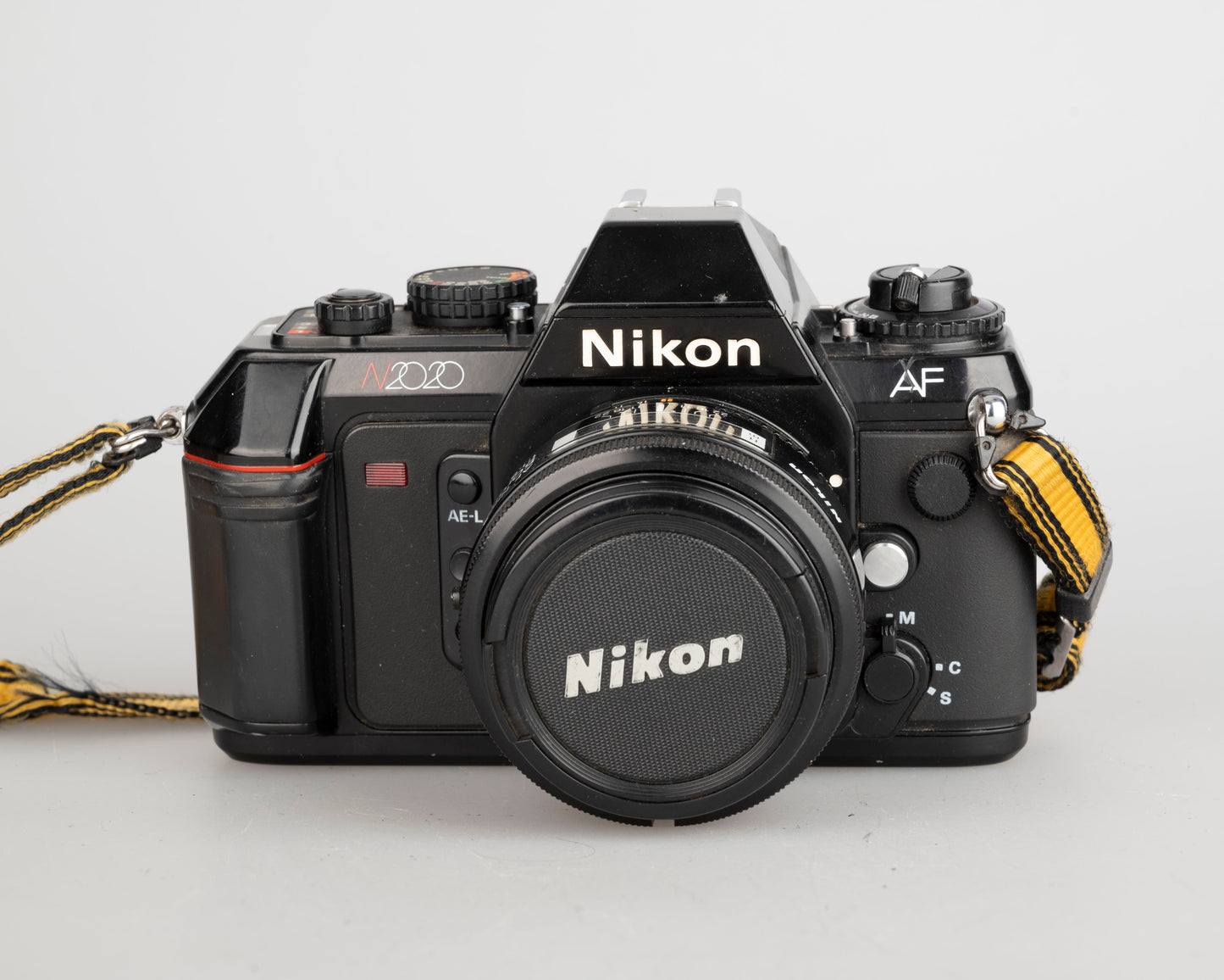 Nikon N2020 35mm film SLR w/ AF Nikkor 50mm f1.8 lens (serial 5387168)