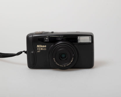 Appareil photo Nikon Zoom 500AF 35 mm avec étui (série 7037755)