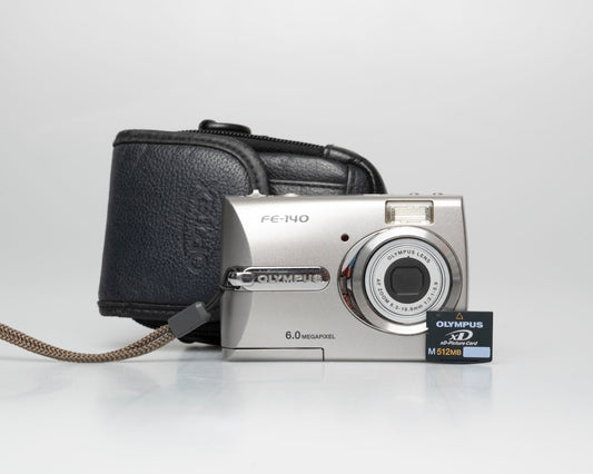 Olympus FE-140 6MP CCD sensor digicam w/ 512MB xD card (serial J69229231)