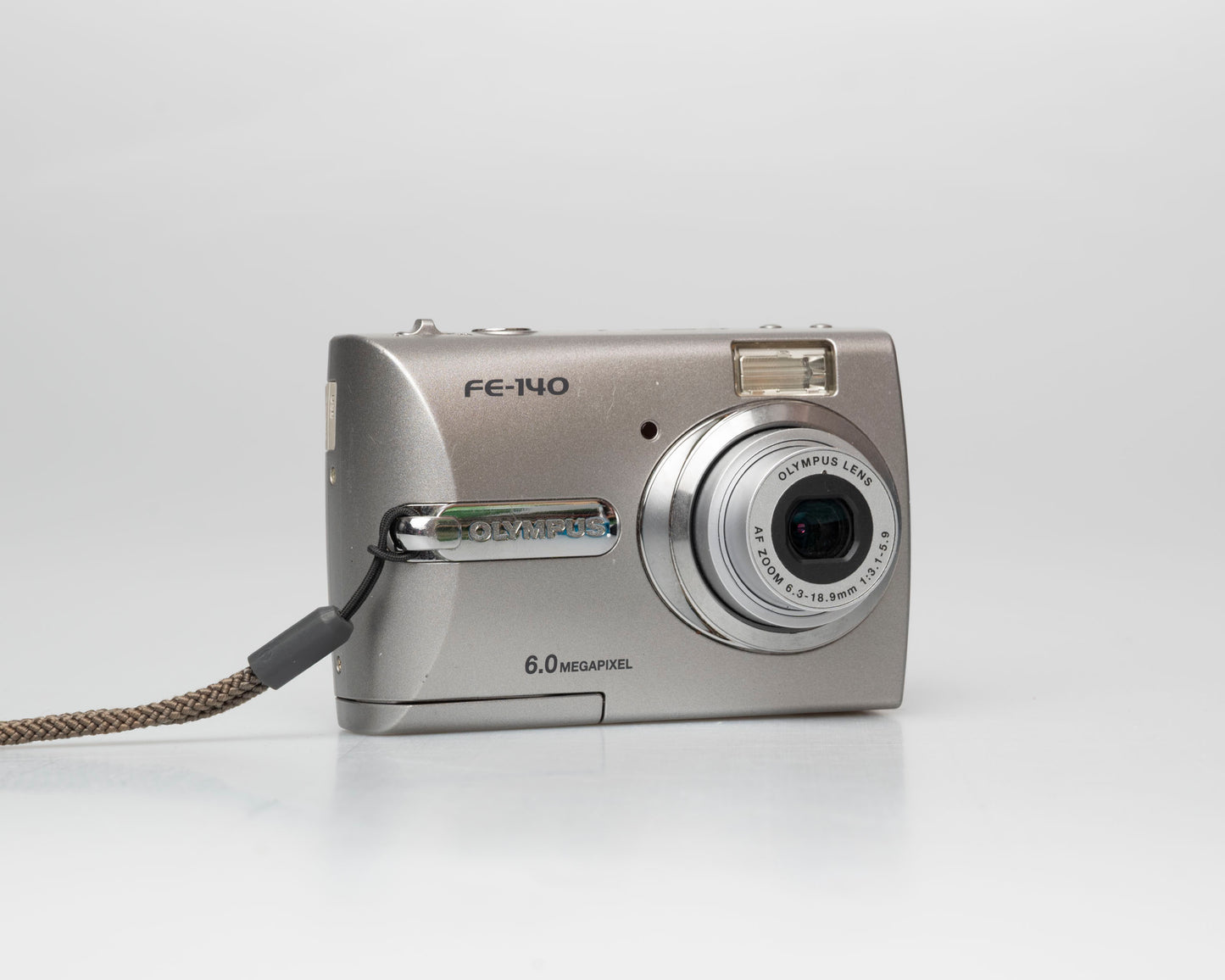 Olympus FE-140 6MP CCD sensor digicam w/ 512MB xD card (serial J69229231)