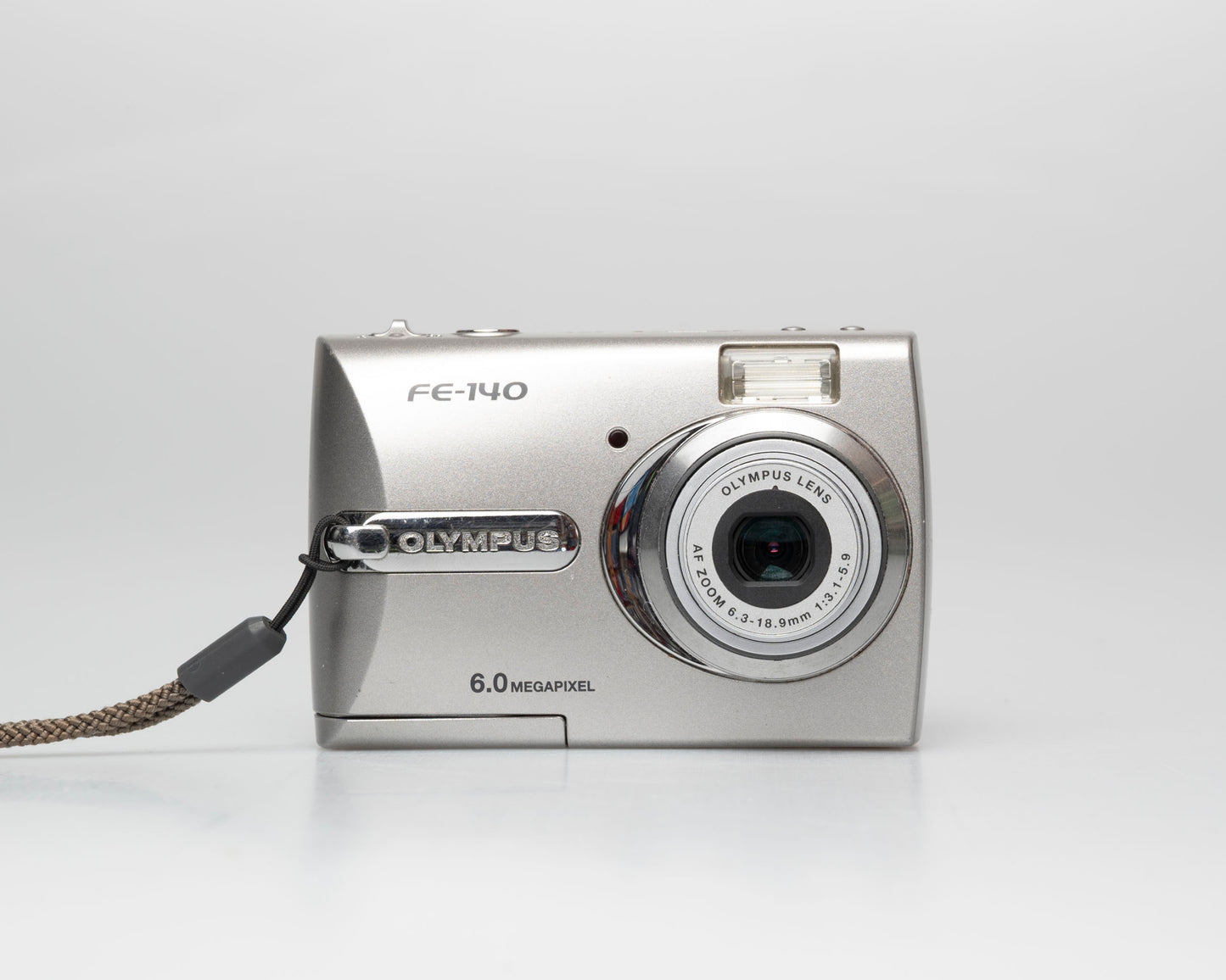 Olympus FE-140 6MP CCD sensor digicam w/ 512MB xD card (serial J69229231)