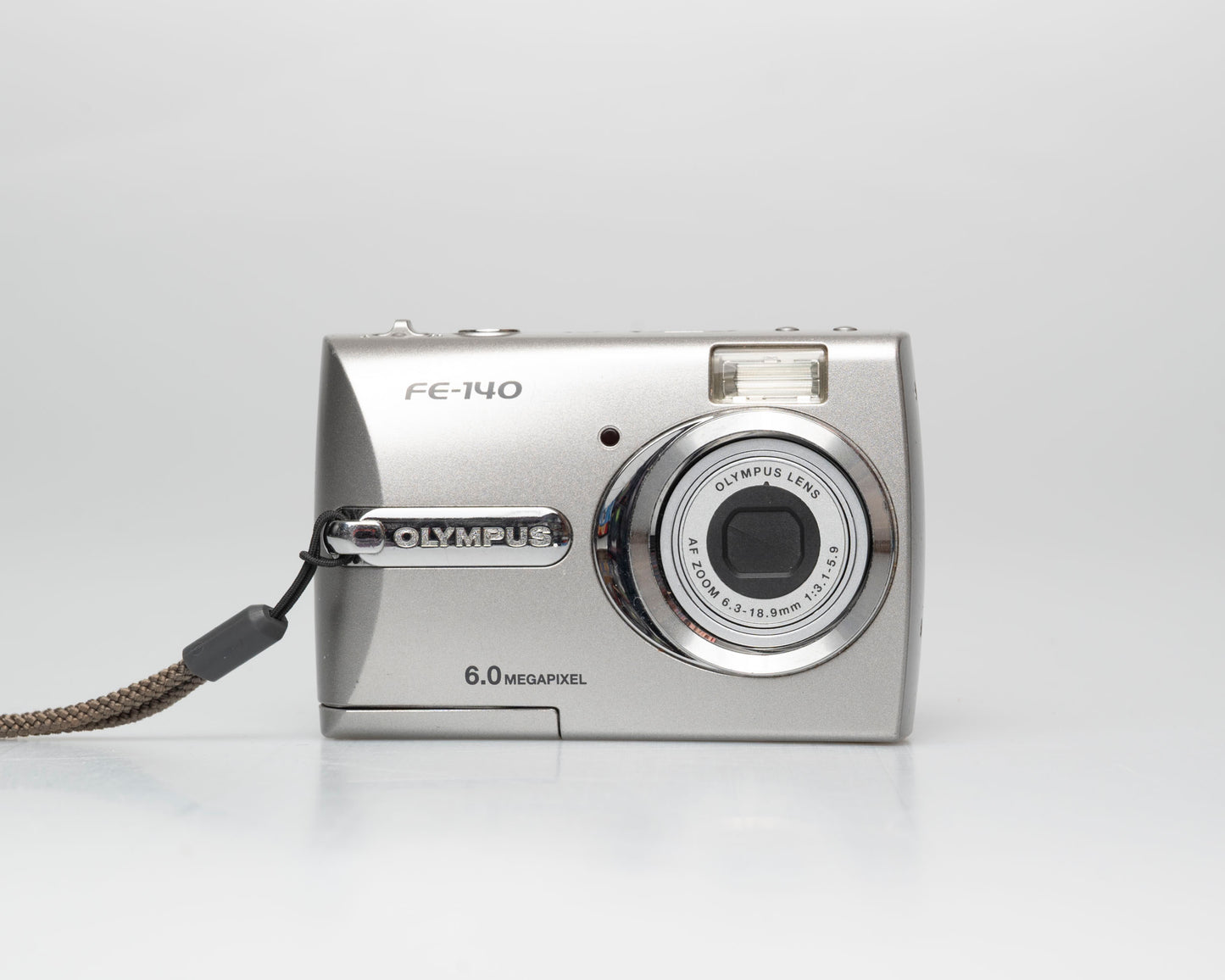 Olympus FE-140 6MP CCD sensor digicam w/ 512MB xD card (serial J69229231)