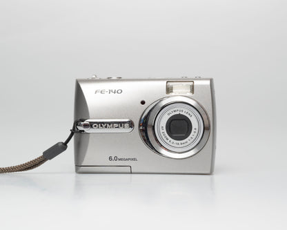 Olympus FE-140 6MP CCD sensor digicam w/ 512MB xD card (serial J69229231)