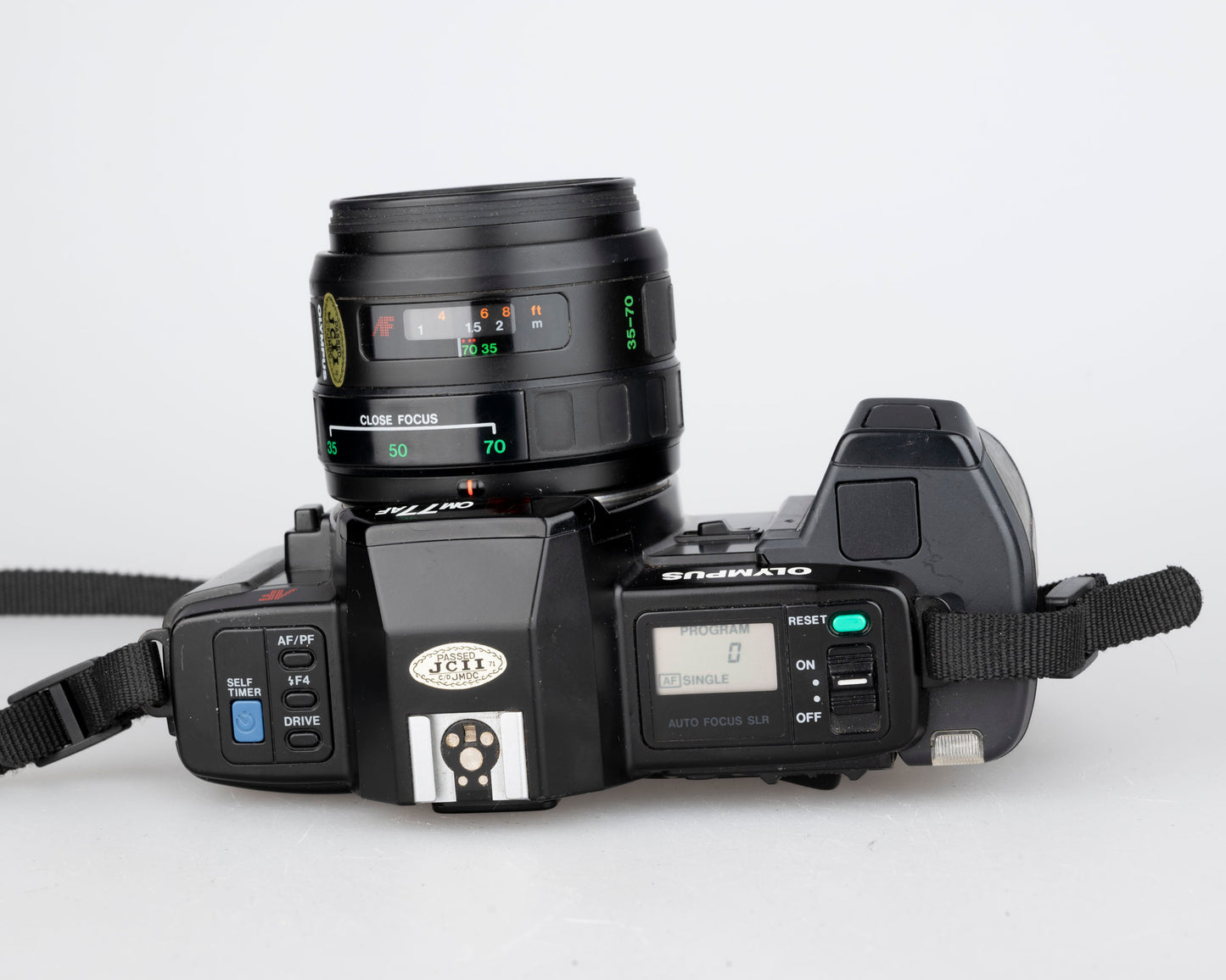 Olympus OM-77AF 35mm film SLR w/ 35-70mm compact zoom len (serial 2051092)