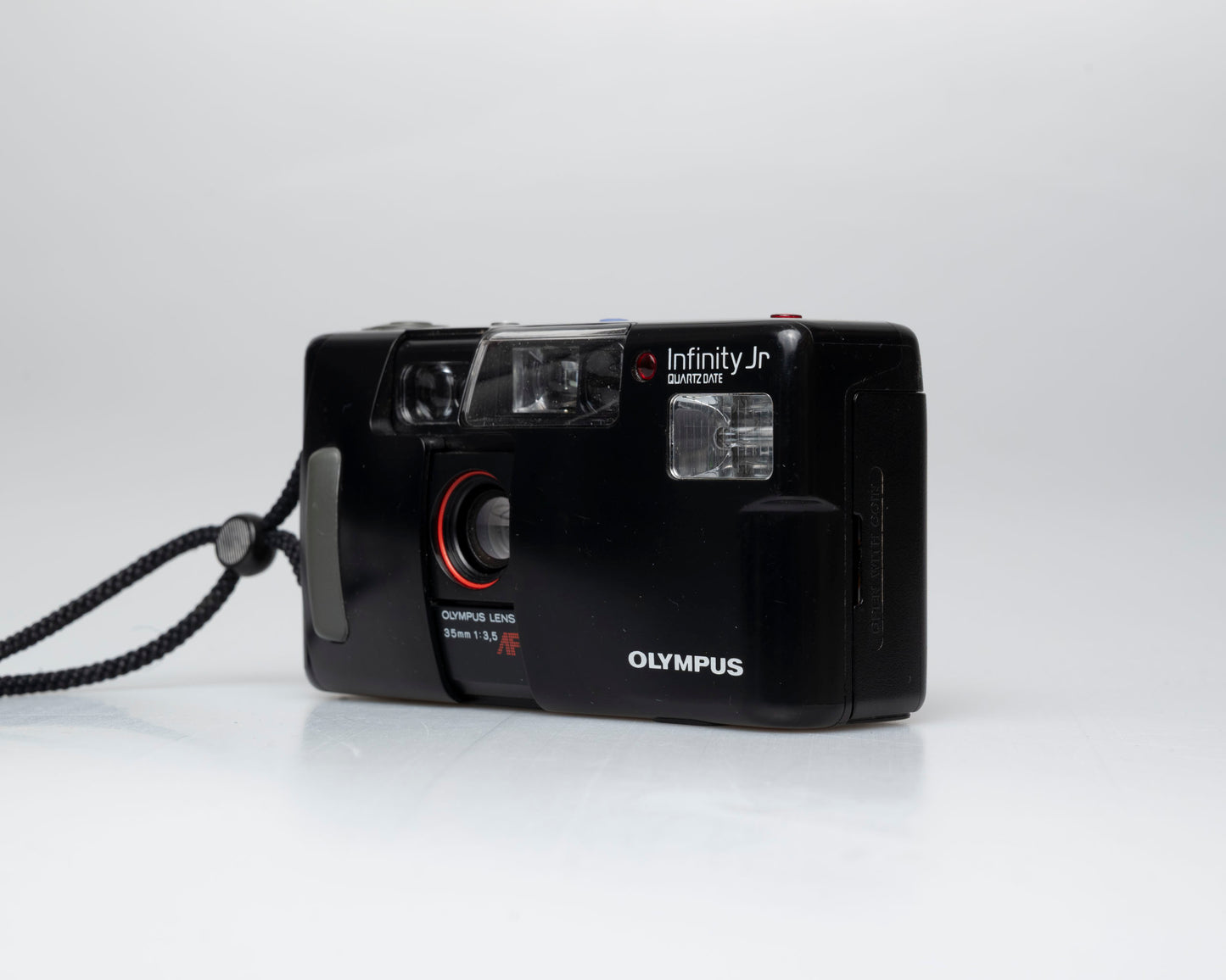 Olympus Infinity Jr Quartz Date 35mm film camera (serial 2496555)