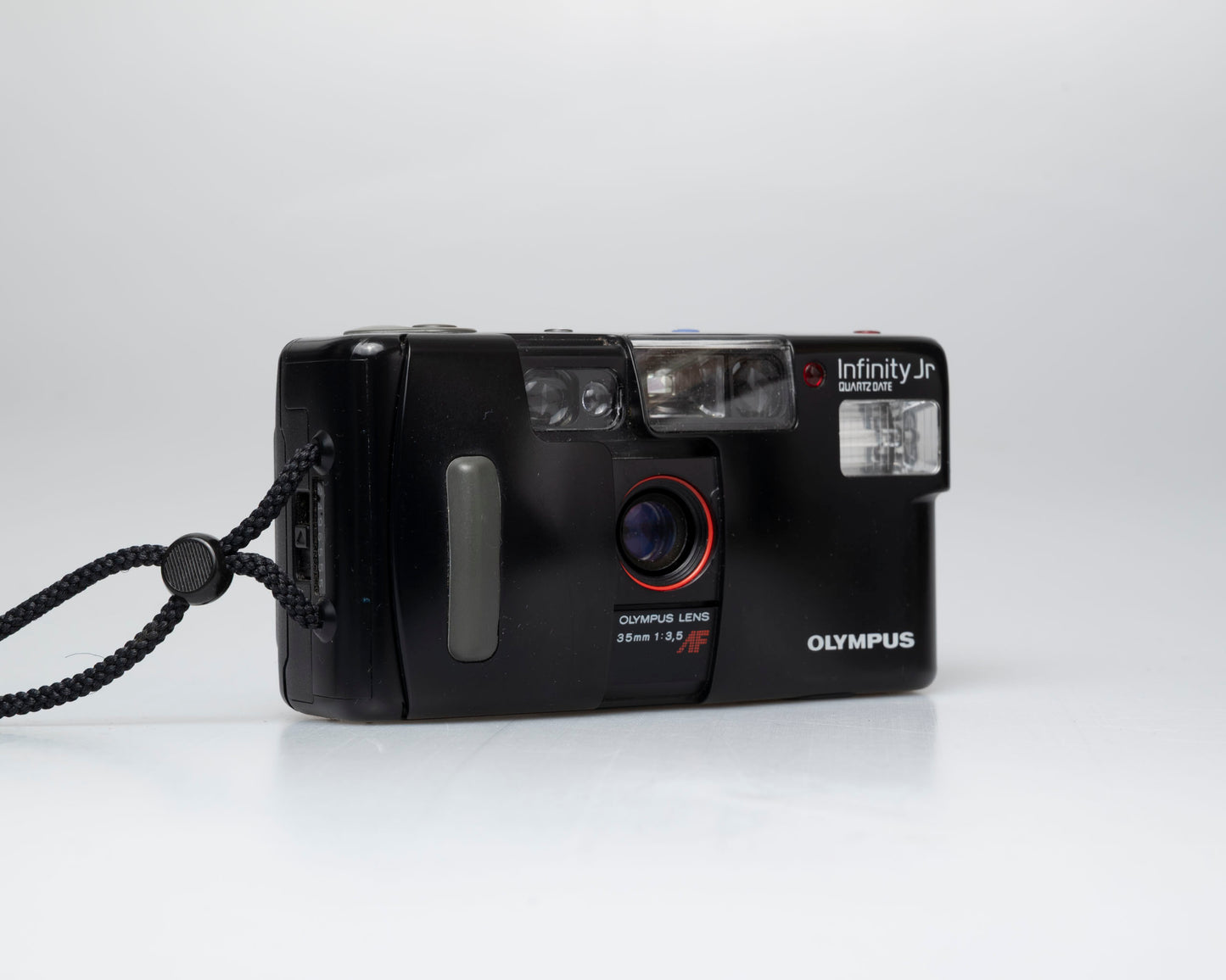 Olympus Infinity Jr Quartz Date 35mm film camera (serial 2496555)