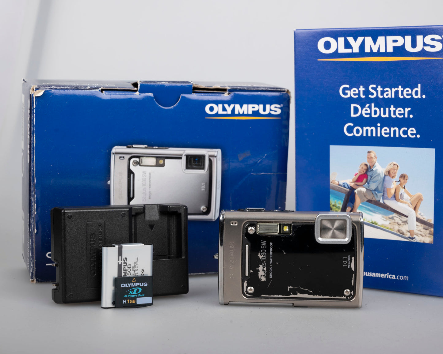 Olympus Stylus 1030 SW 10MP CCD sensor ruggedized digicam w/ charger + battery + 1GB XD card + original box + manuals