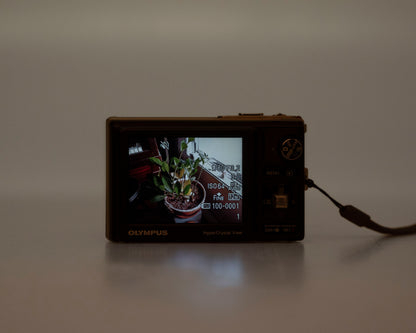 Olympus Stylus 9000 12MP digicam w/ 16GB card + adapter + charger + battery (serial H16512514)