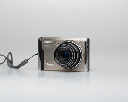 Olympus Stylus 9000 12MP digicam w/ 16GB card + adapter + charger + battery (serial H16512514)
