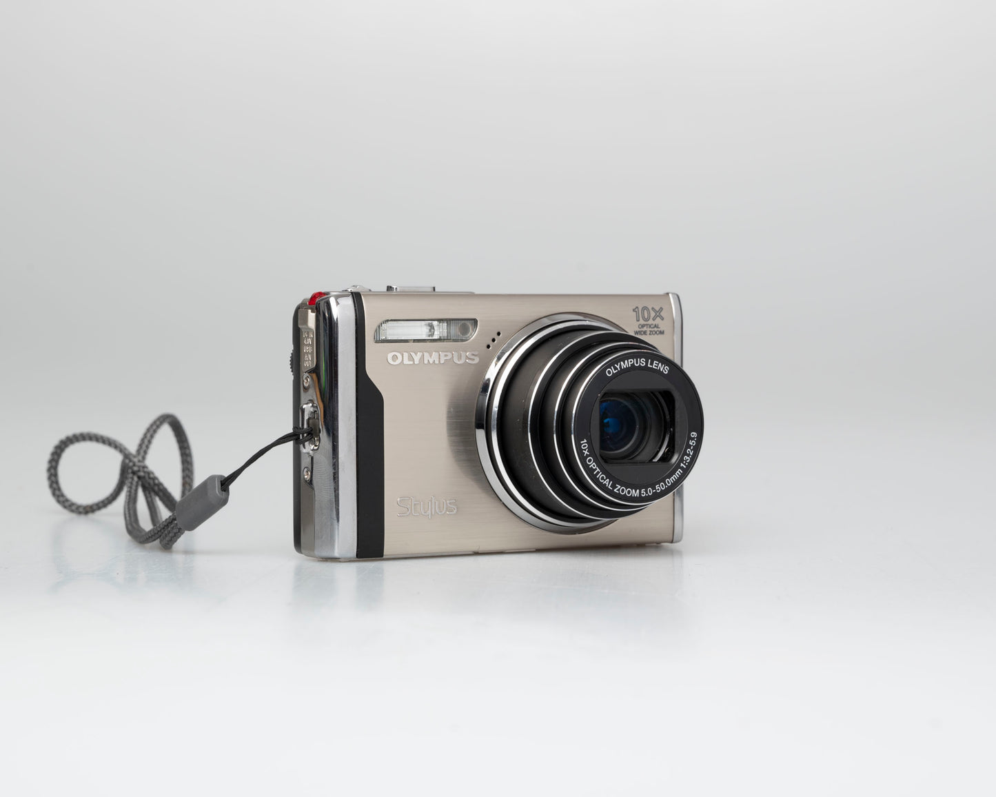 Olympus Stylus 9000 12MP digicam w/ 16GB card + adapter + charger + battery (serial H16512514)